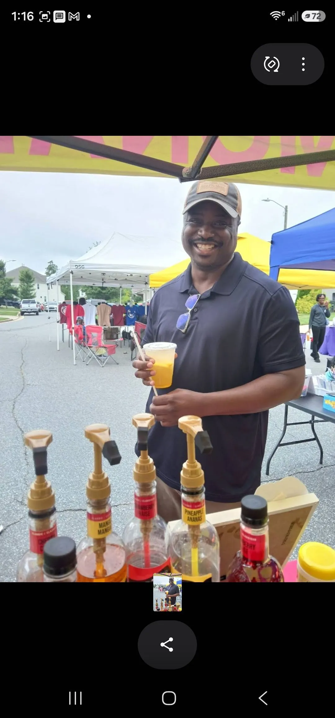 Vendor serving colorful drinks at Goins 2Get United